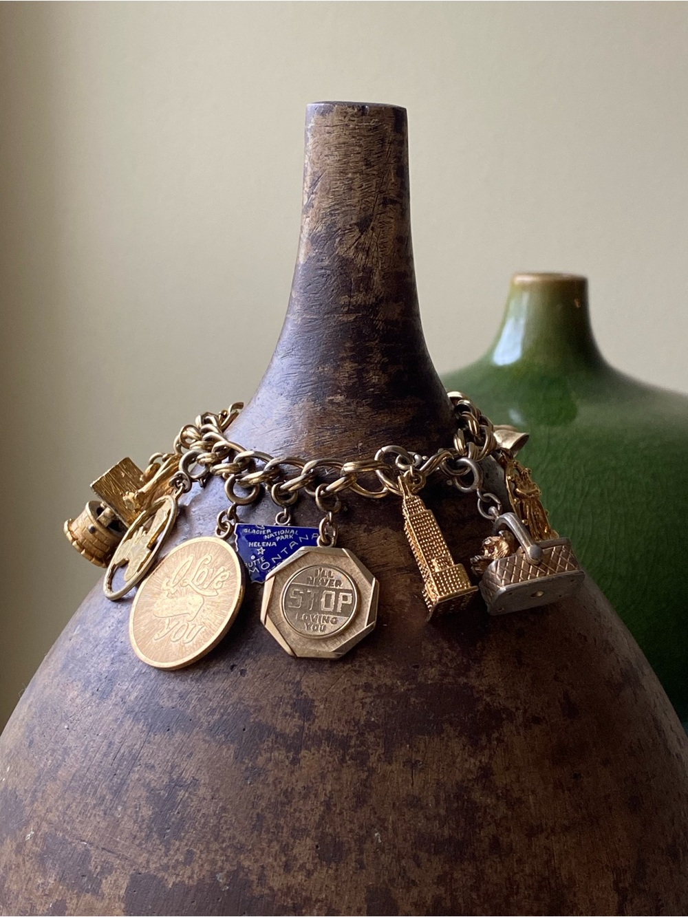 Vintage Monet Gold-Tone Charm Bracelet with 11 Removable Charms